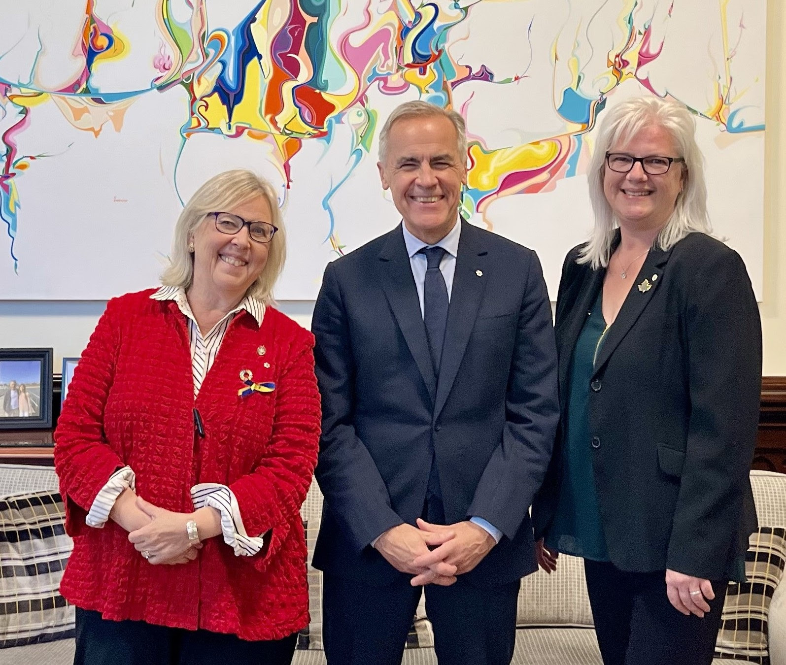 Elizabeth May with Prime Minister Carney and Marlene Wells 